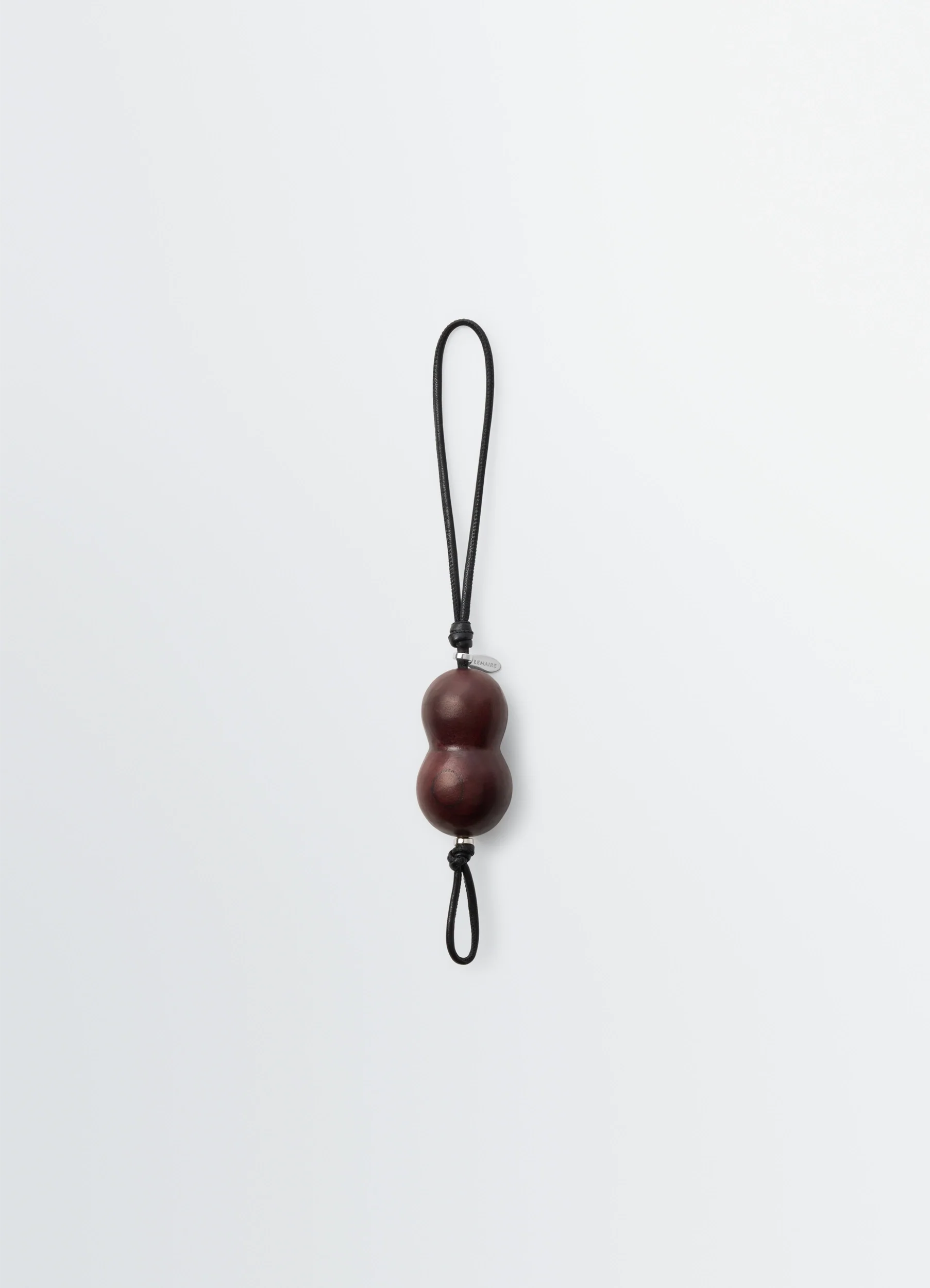 PEANUT HEEL CHARM IN LEATHER